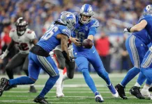 Week 11 NFL Predictions from the T Shoe Index Detroit Lions quarterback Jared Goff hands the ball to running back Jahmyr Gibbs against Tampa Bay Buccaneers in the NFC divisional roun..