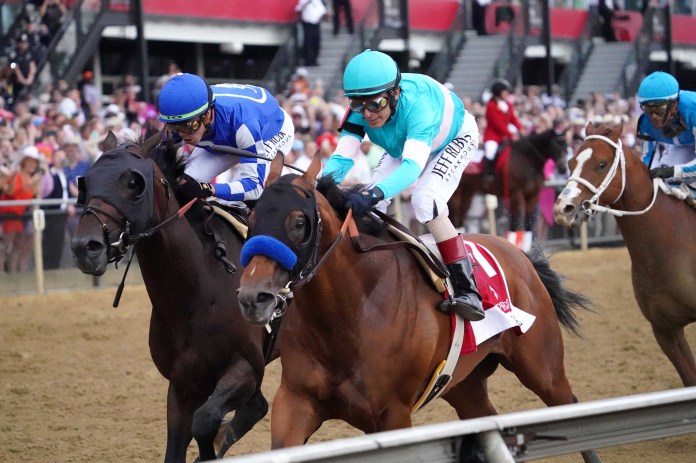 Natural Treasure with jockey John Velazquez aboard wins the 148th running of the Preakness Stakes at Pimlico Race Course