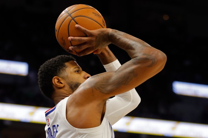 Los Angeles Clippers forward Paul George shoots against the Minnesota Timberwolves in the third quarter at Target Center.