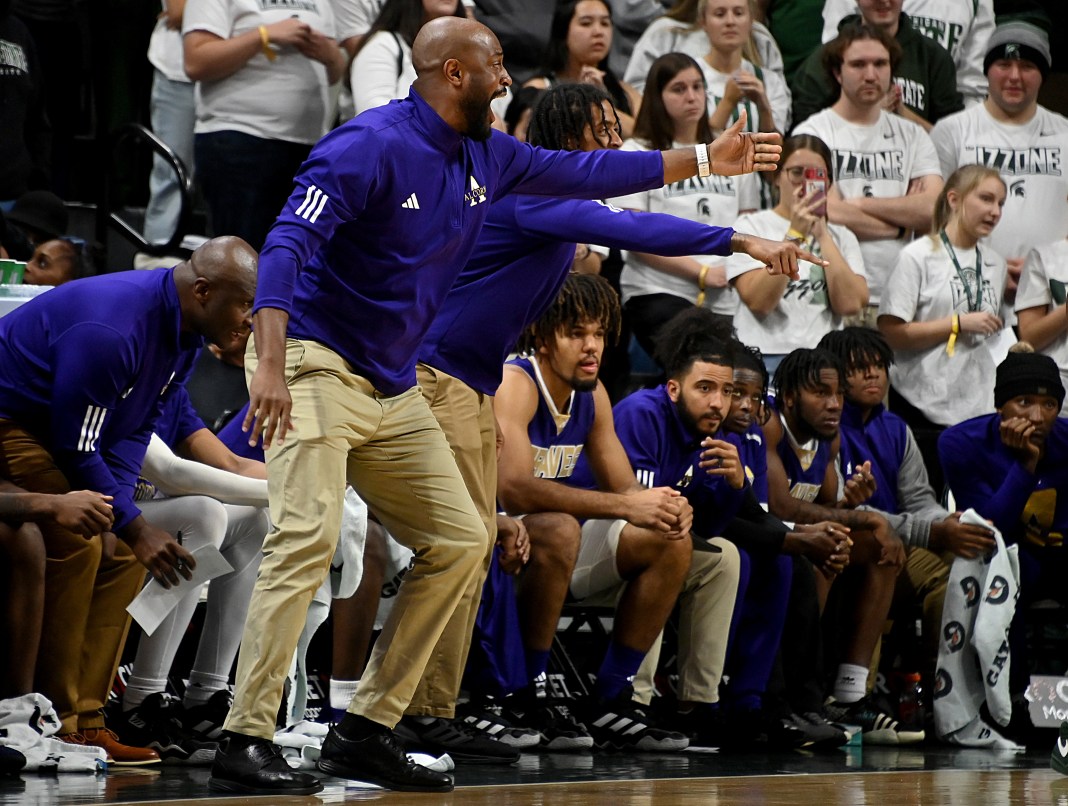 Alcorn State Braves head coach Landon Bussie shouts instructions to his team as they play the Michigan State Spartans at Jack Breslin Student Events Center.