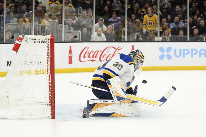 St. Louis Blues goaltender Joel Hofer makes a save during the first period against the Boston Bruins at TD Garden.