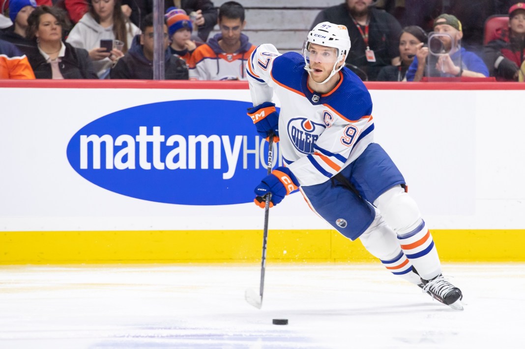 Edmonton Oilers center Connor McDavid skates with the puck in the second period against the Ottawa Senators at the Canadian Tire Centre.