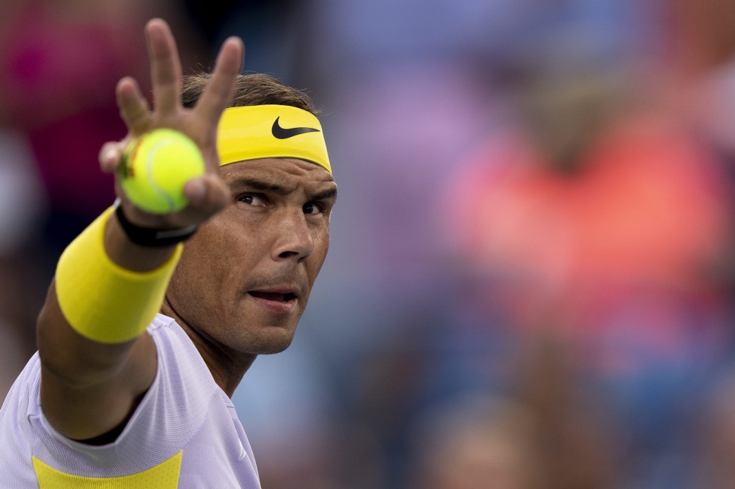 Rafael Nadal waves to the crowd during his match against Borna Coric at the 2022 Cincinnati Open.