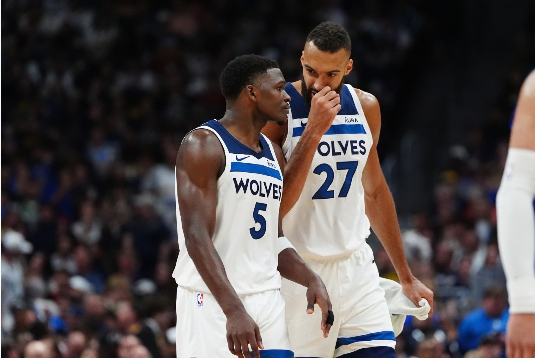 Minnesota Timberwolves stars Anthony Edwards and Rudy Gobert talk during a Game 7 meeting with the Denver Nuggets.