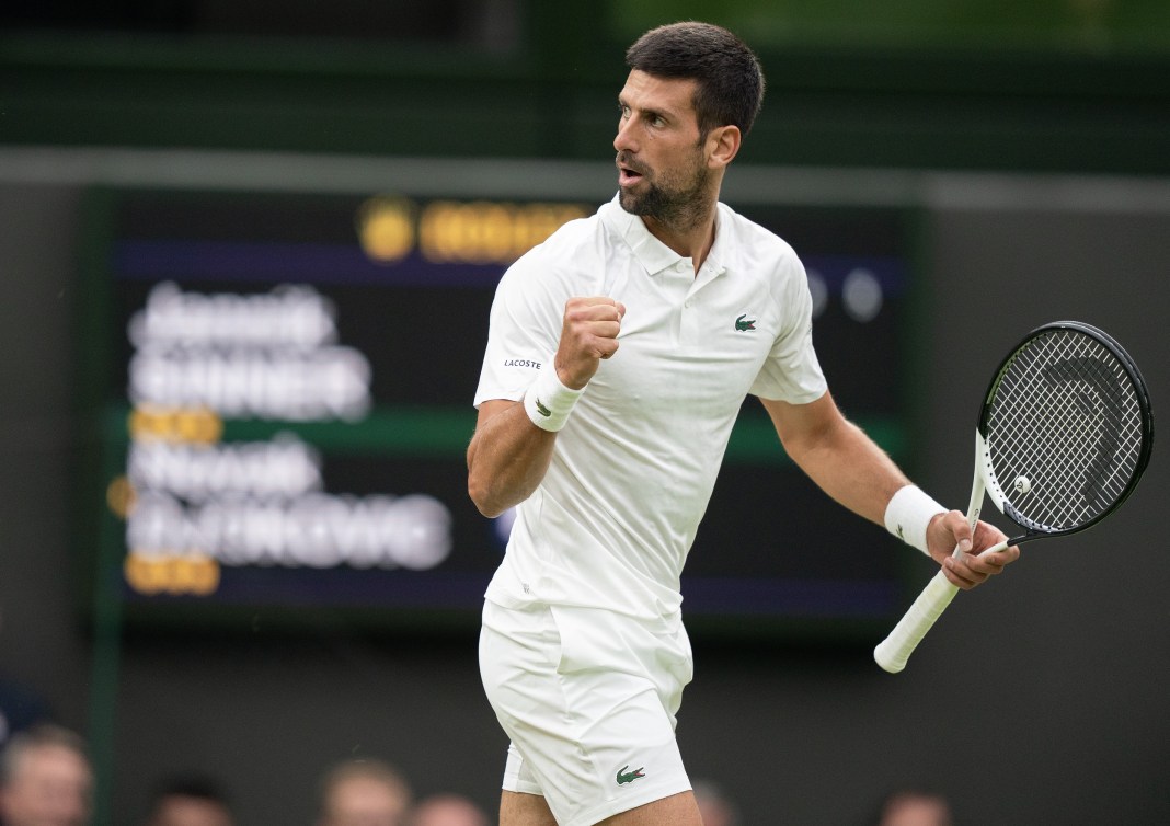Novak Djokovic celebrates a big point against Jannik Sinner at Wimbledon in 2023.