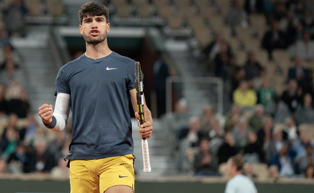 Carlos Alcaraz celebrates a big point in his match against Sebastian Korda at the 2024 French Open.