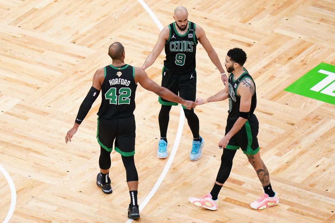 The Boston Celtics celebrate a big win over the Dallas Mavericks in Game 2 of the NBA Finals.