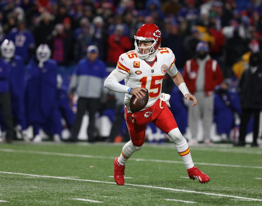 Chiefs quarterback Patrick Mahomes has an open area to move about as he looks for a receiver during the first half of the Bills divisional game against Kansas City Chiefs at Highmark Stadium in Orchard Park