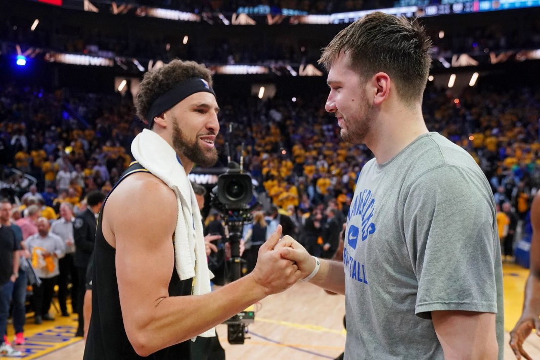 Klay Thompson greets Luka Doncic after a meeting between the Dallas Mavericks and Golden State Warriors.