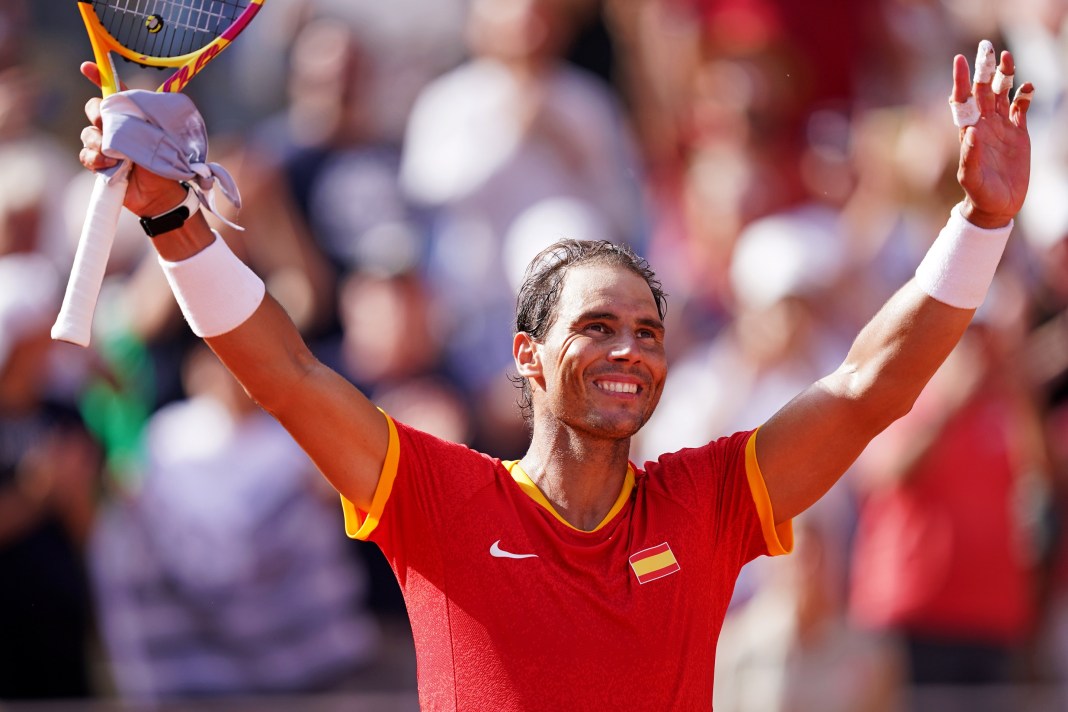 Rafael Nadal celebrates a win over Marton Fucsovics at the Paris Olympics.