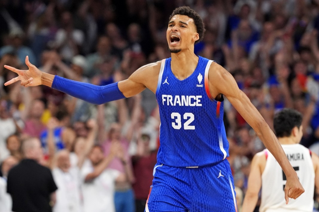 Victor Wembanyama celebrates France's win over Japan at the 2024 Paris Olympics.