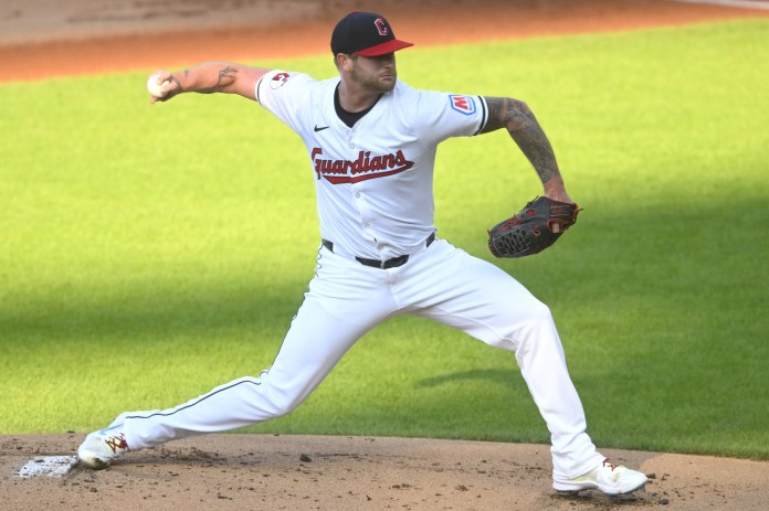 Cleveland Guardians starting pitcher Ben Lively (39) delivers a pitch during the first inning of the game against the Chicago Cubs at Progressive Field in Cleveland, Ohio, on August 12, 2024.
