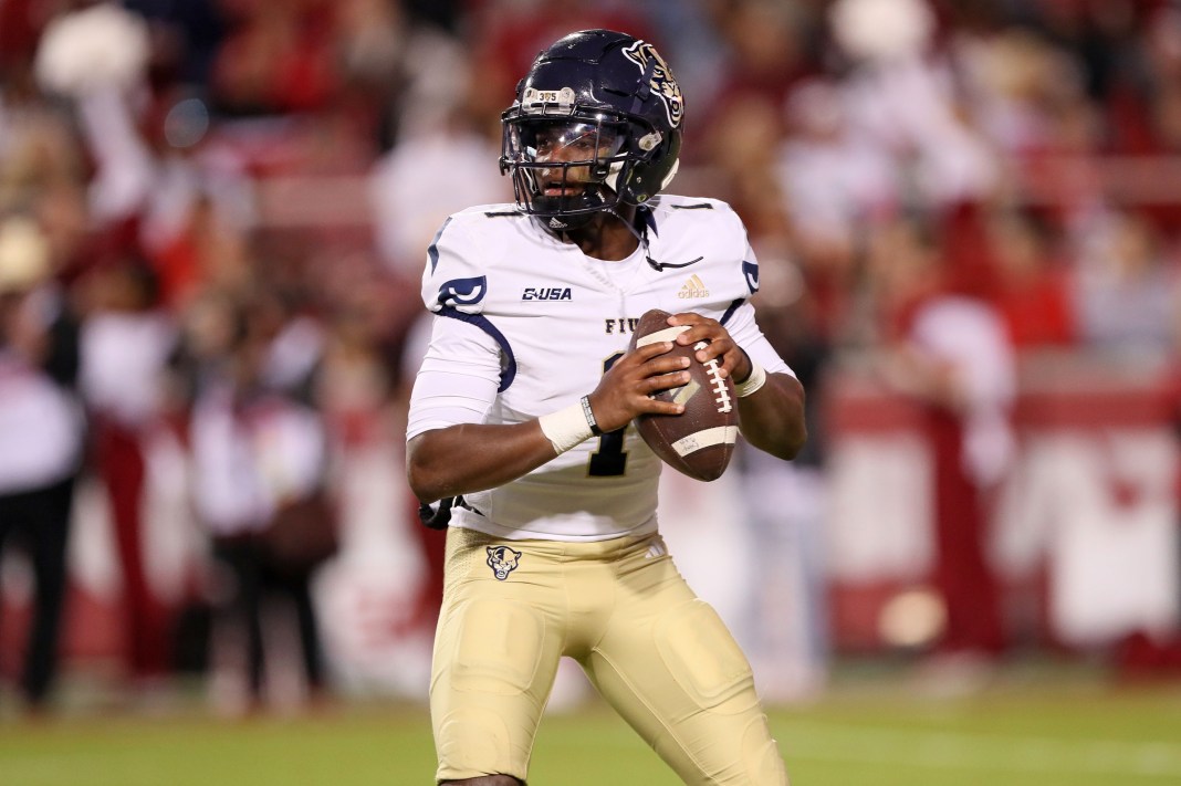 FIU Panthers quarterback Keyone Jenkins (1) looks to pass in the second quarter against the Arkansas Razorbacks