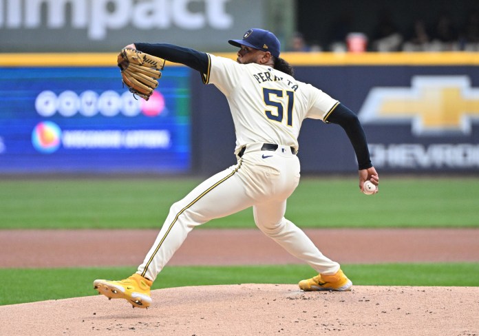Milwaukee Brewers pitcher Freddy Peralta (51) delivers a pitch during the first inning of the game against the Los Angeles Dodgers at American Family Field in Milwaukee, Wisconsin, on August 12, 2024.