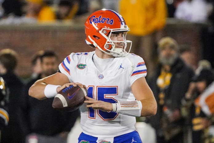 Florida Gators quarterback Graham Mertz (15) warms up before the game against the Missouri Tigers at Faurot Field at Memorial Stadium in Columbia, Missouri, on November 18, 2023.