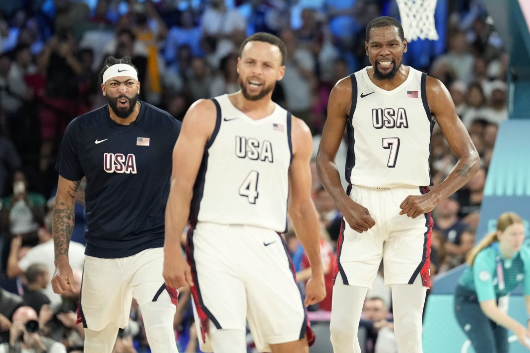 Steph Curry reacts to USA's big win over Serbia at the 2024 Paris Olympics.