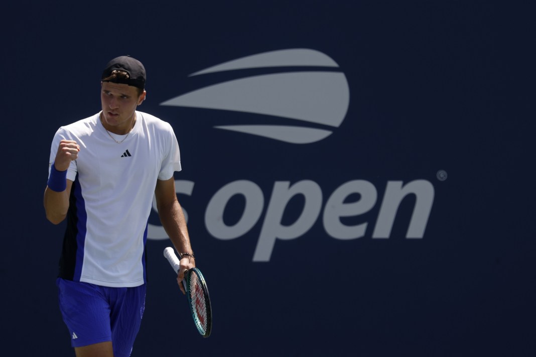 Jakub Mensik reacts after winning a game against Felix Auger-Aliassime at the 2024 US Open.