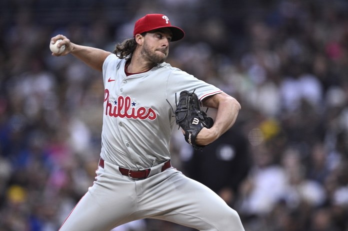 Philadelphia Phillies starting pitcher Aaron Nola (27) delivers a pitch during the first inning against the San Diego Padres at Petco Park on April 26, 2024.