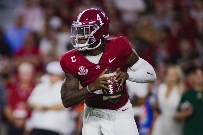 Alabama Crimson Tide quarterback Jalen Milroe (4) looks for a pass against the South Florida Bulls during the second quarter at Bryant-Denny Stadium on September 7, 2024.