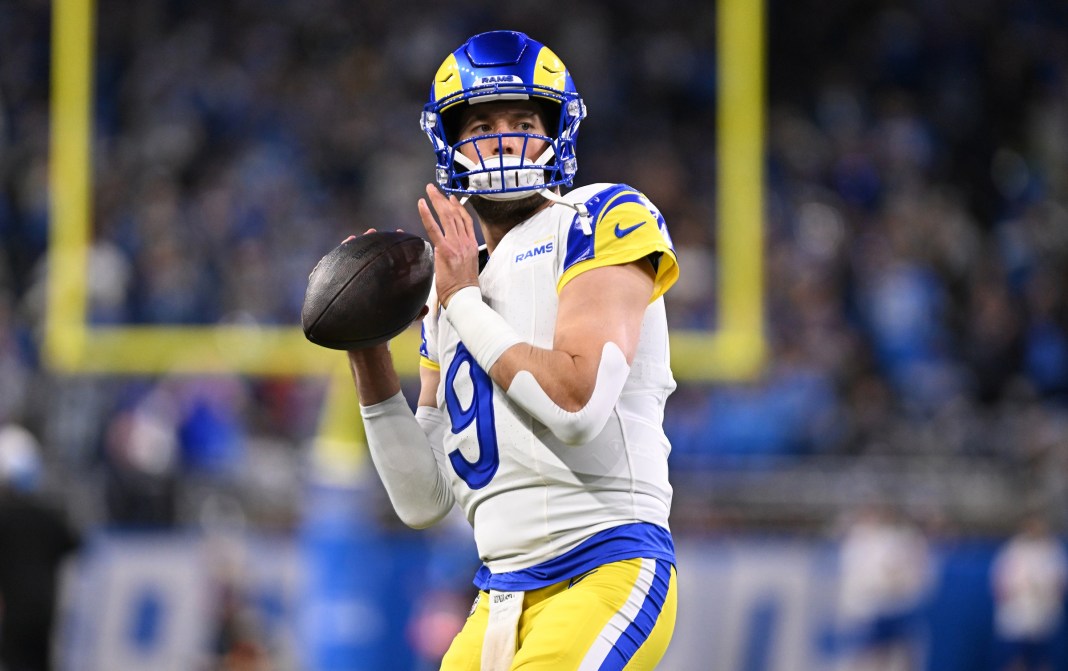 Matthew Stafford throws a pass in the Los Angeles Rams' meeting with the Detroit Lions in the 2023 postseason.