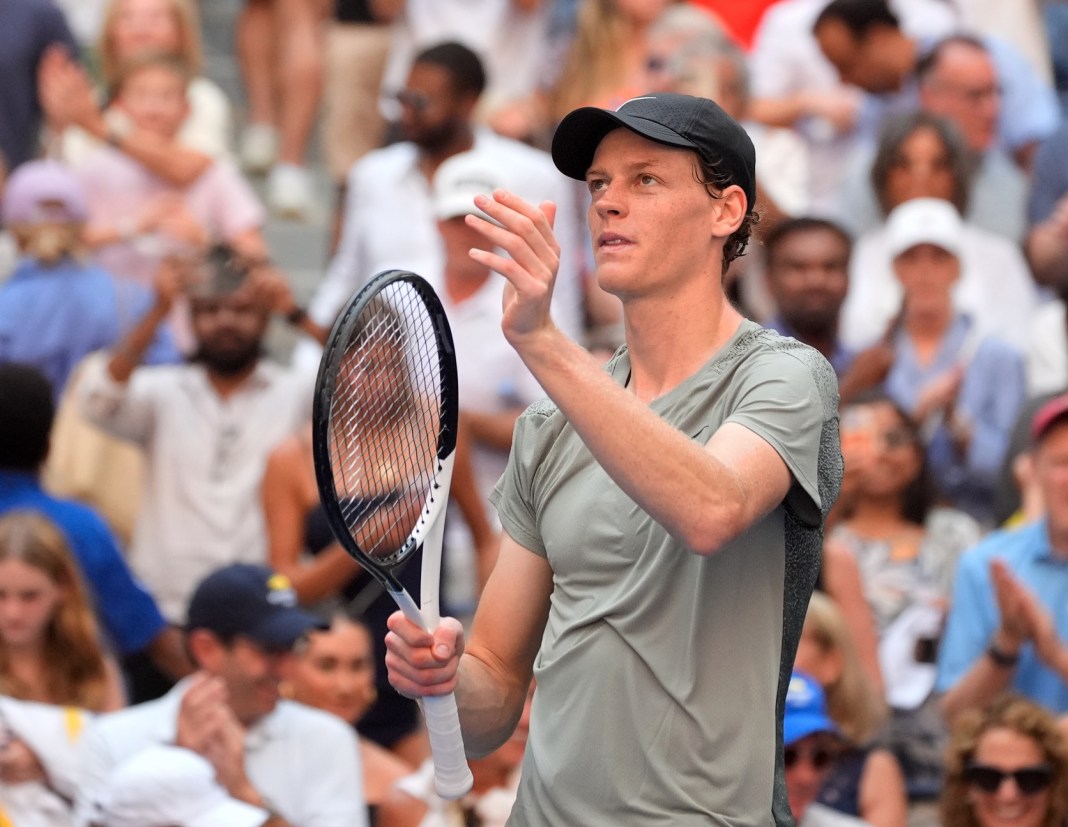 Jannik Sinner thanks the crowd after a win over Christopher O'Connell at the 2024 US Open.