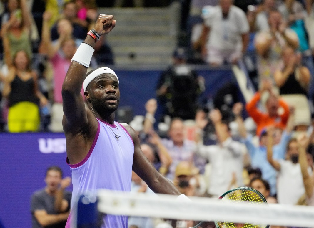 Frances Tiafoe celebrates his massive win over Alexei Popyrin at the 2024 US Open.