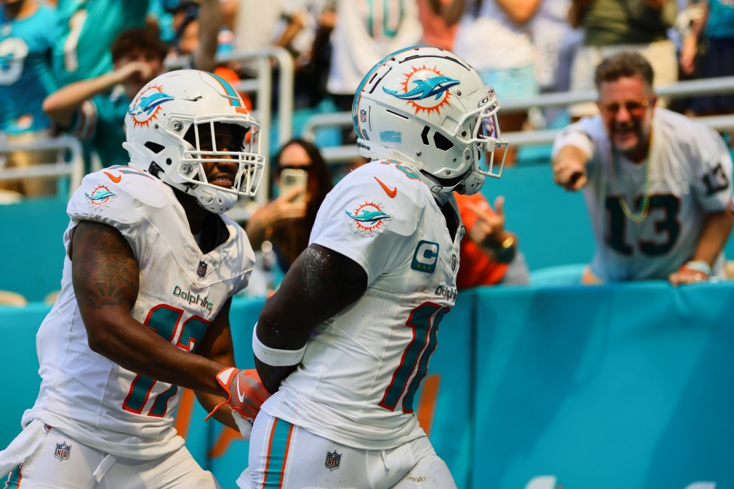 Dolphins wide receiver Tyreek Hill pokes fun at his arrest with his touchdown celebration against the Jacksonville Jaguars.