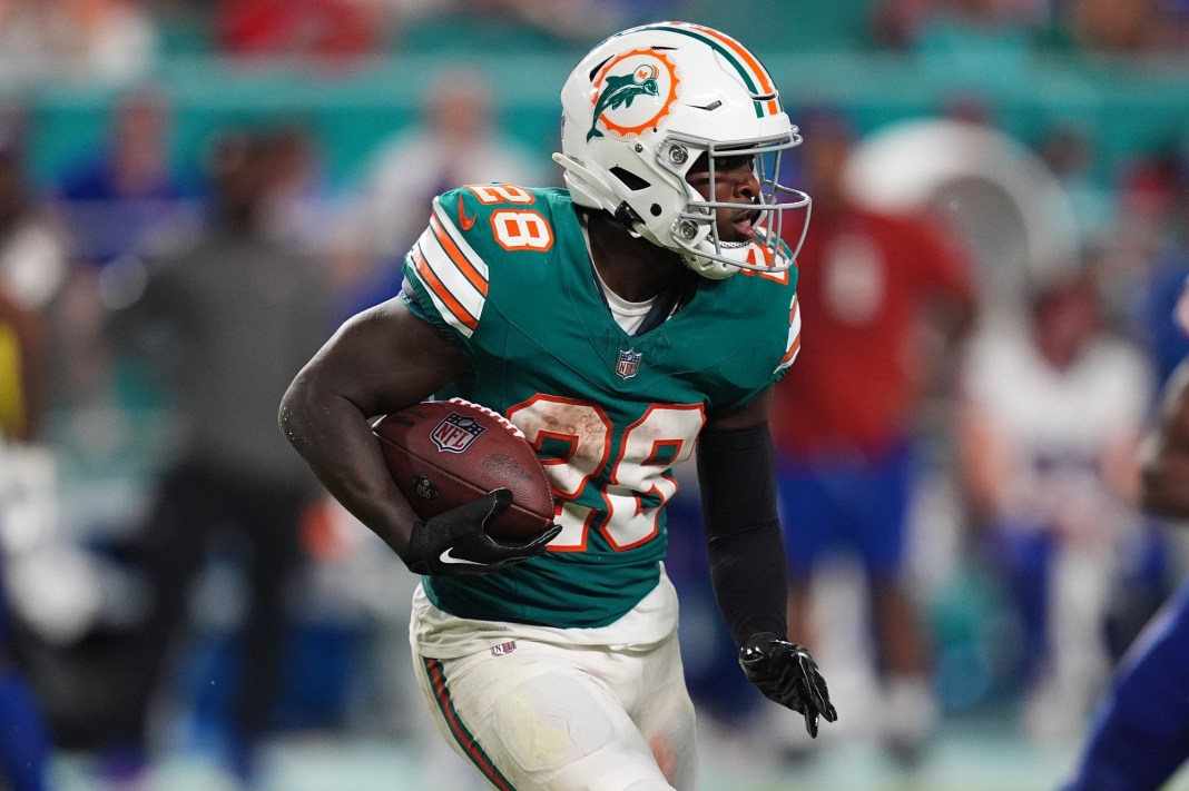 Dolphins running back De'Von Achane looks to run the ball against the Bills.