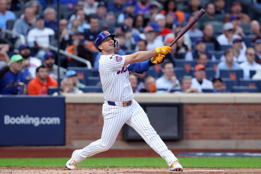 New York Mets first baseman Pete Alonso (20) hits a solo home run in the second inning against the Philadelphia Phillies during game three of the NLDS for the 2024 MLB Playoffs