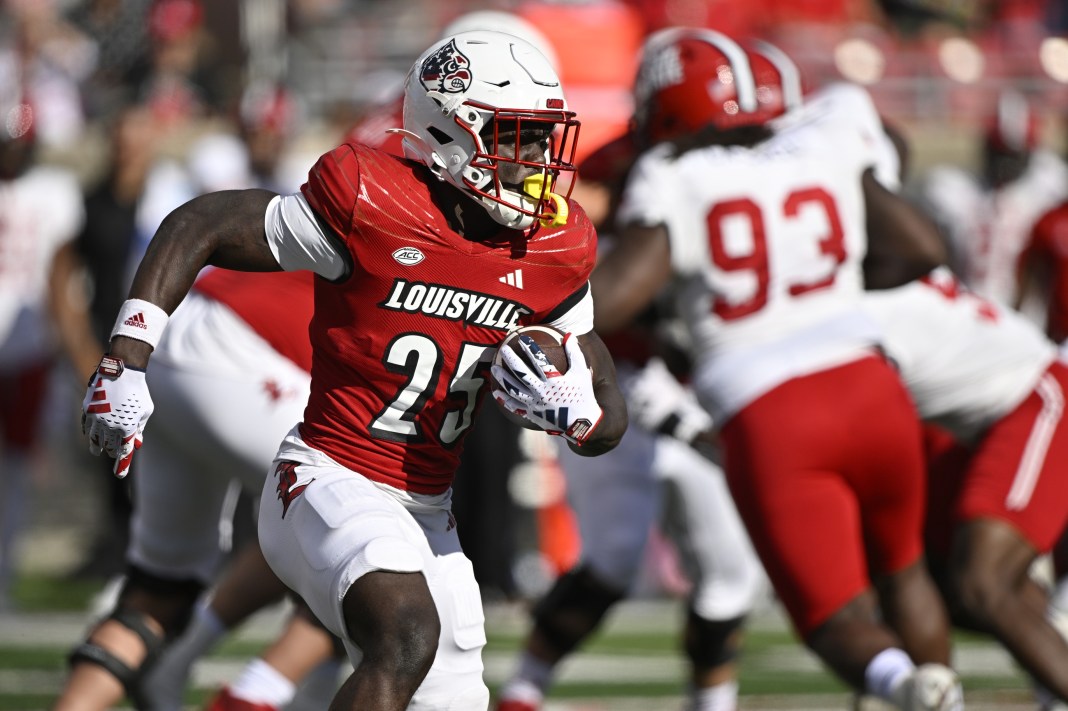 Louisville running back Isaac Brown runs the ball against Jacksonville State.