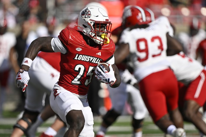 Louisville running back Isaac Brown runs the ball against Jacksonville State.