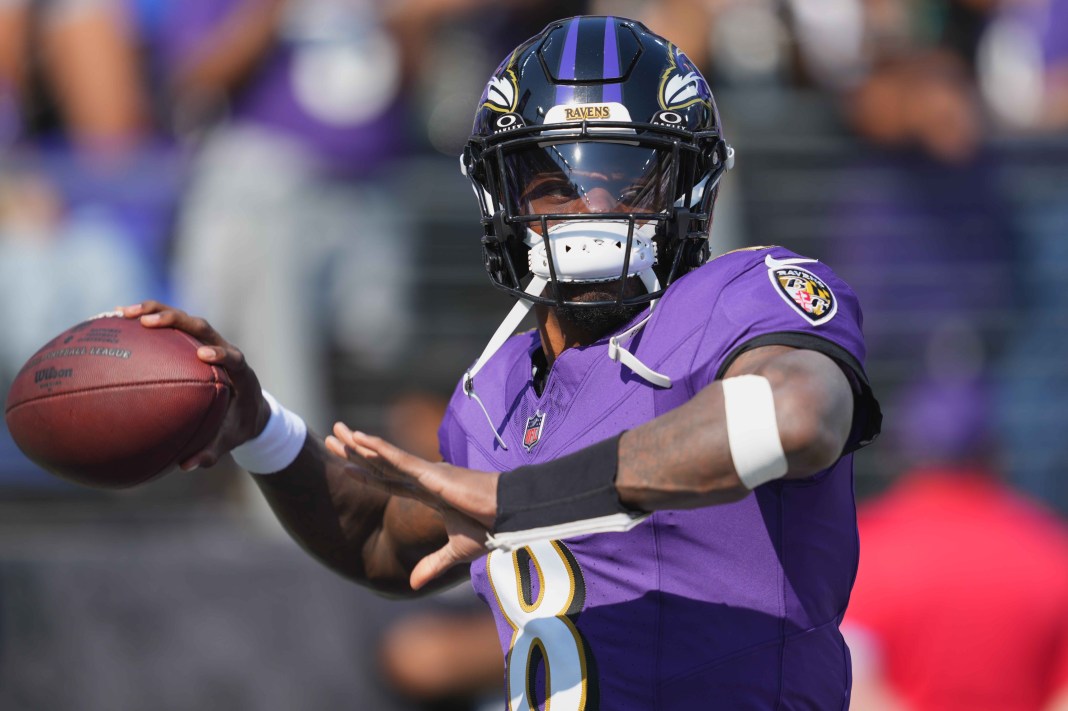 Ravens quarterback Lamar Jackson warms up before taking on the Commanders in Week 6 of the 2024 NFL season.