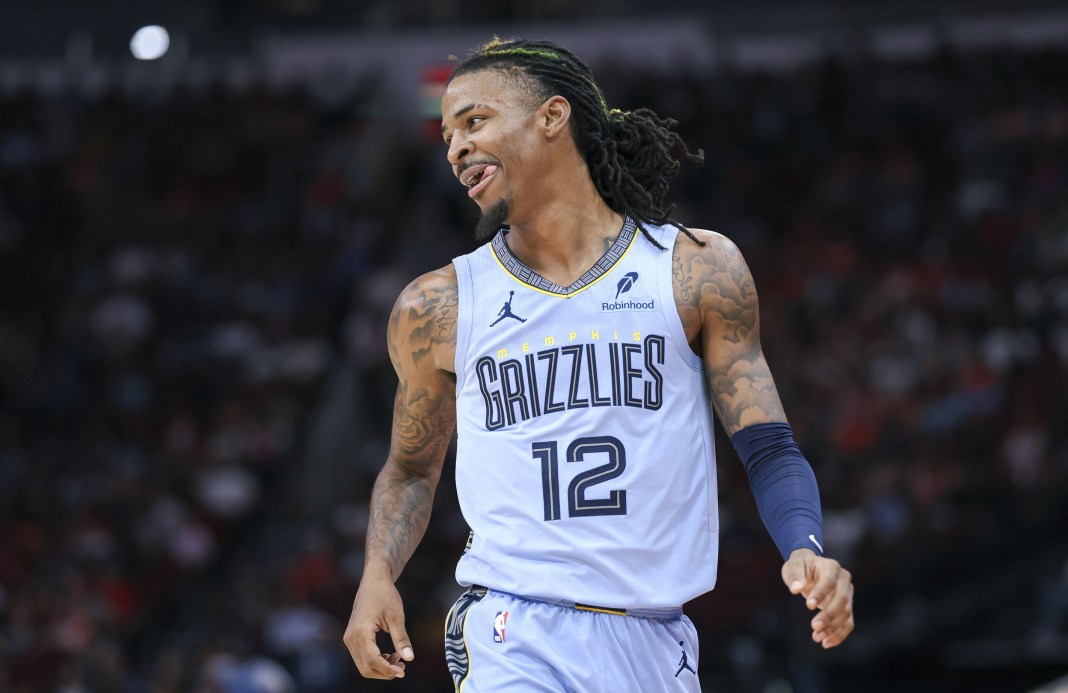 Grizzlies star Ja Morant reacts after a play against the Rockets in the 2024-25 NBA season.