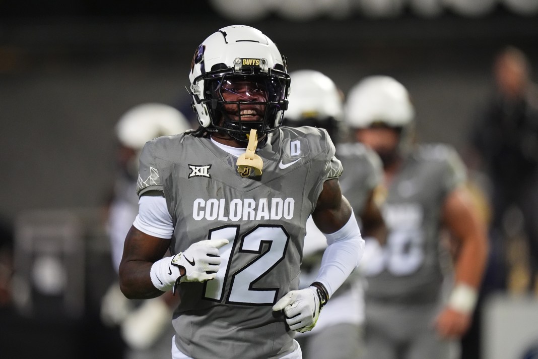 Colorado star Travis Hunter runs off the field in a meeting with Cincinnati.