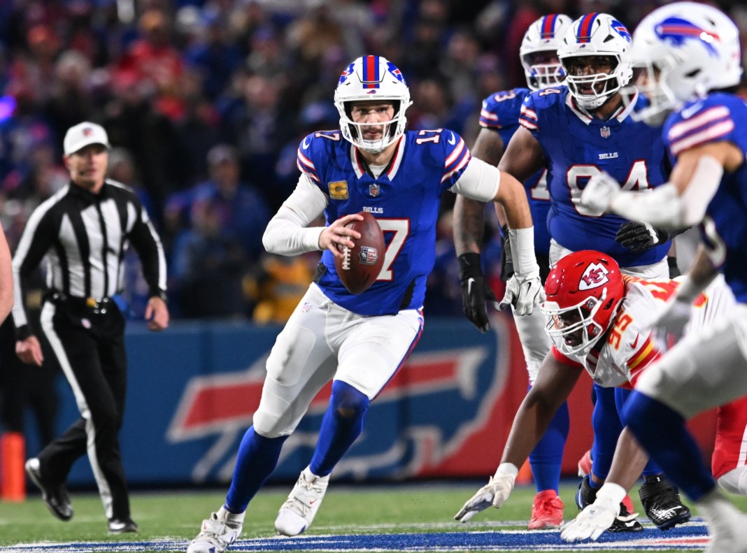 Buffalo Bills quarterback Josh Allen runs for a first down in the second quarter against the Kansas City Chiefs