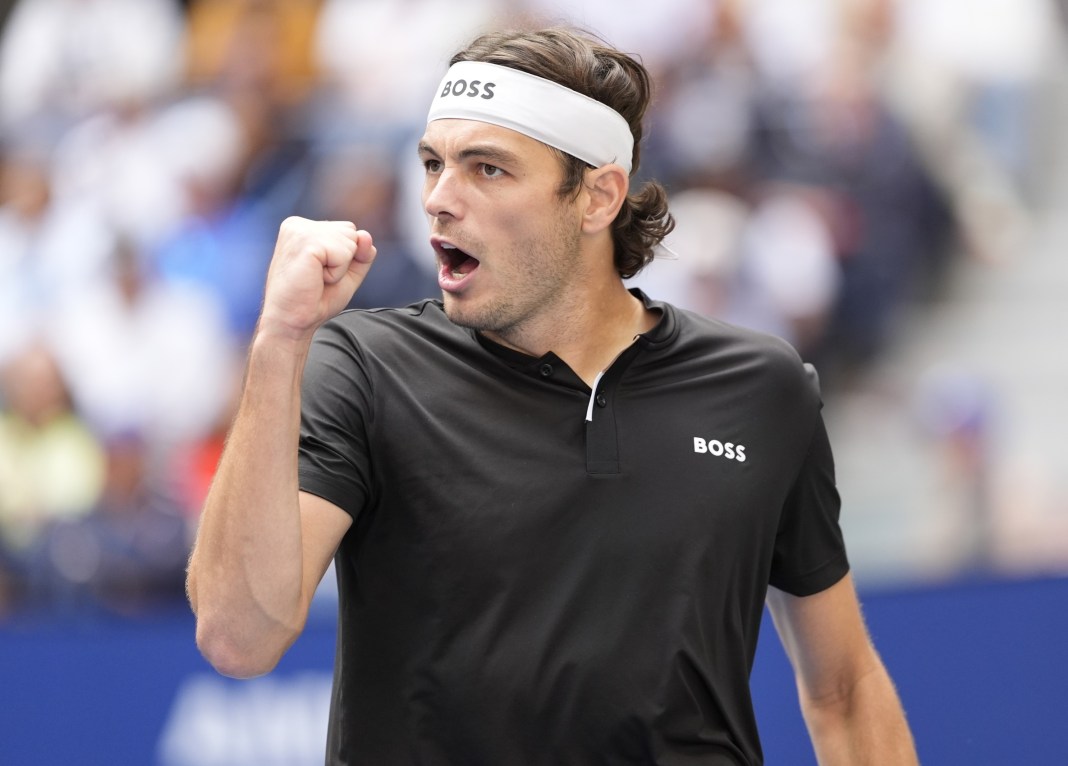 Taylor Fritz celebrates winning a point in his match against Jannik Sinner in the 2024 US Open final.