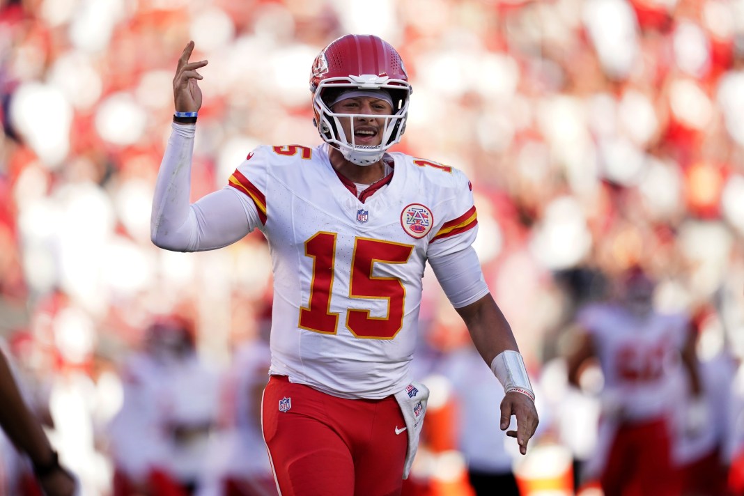 Chiefs superstar Patrick Mahomes reacts to a touchdown scored against the 49ers in the 2024 NFL season.