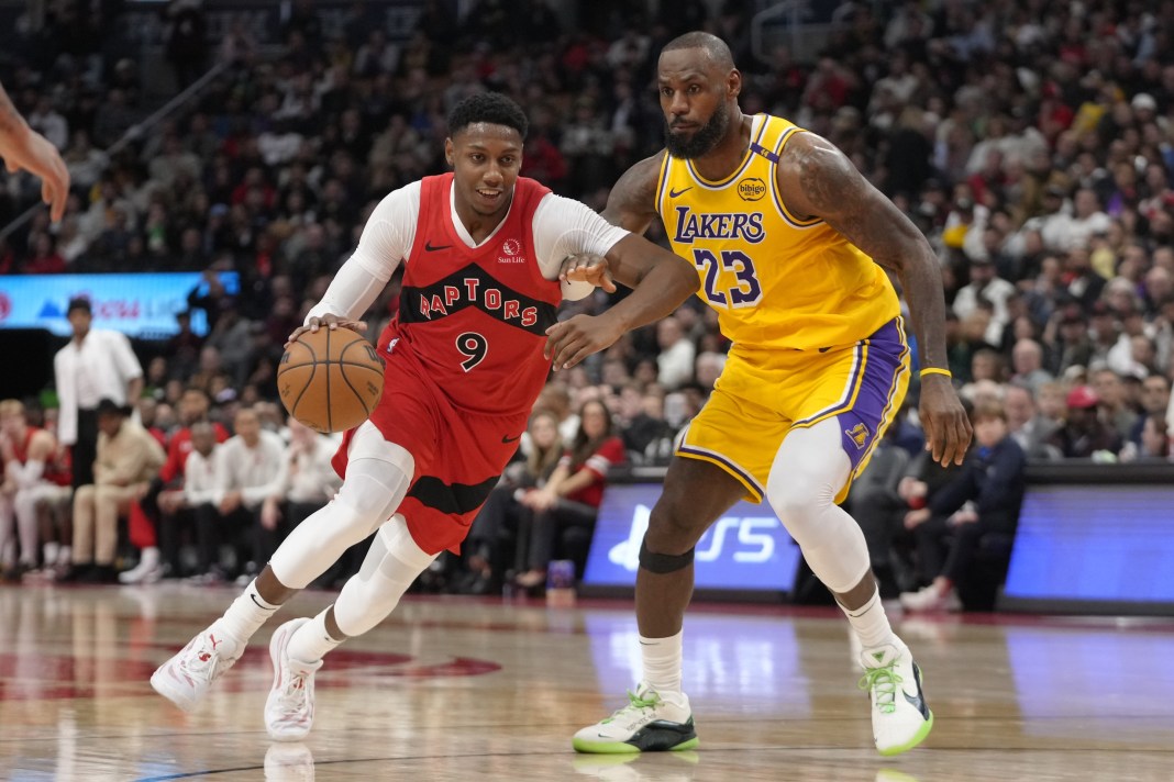 Raptors forward R.J. Barrett drives to the basket against the Lakers.