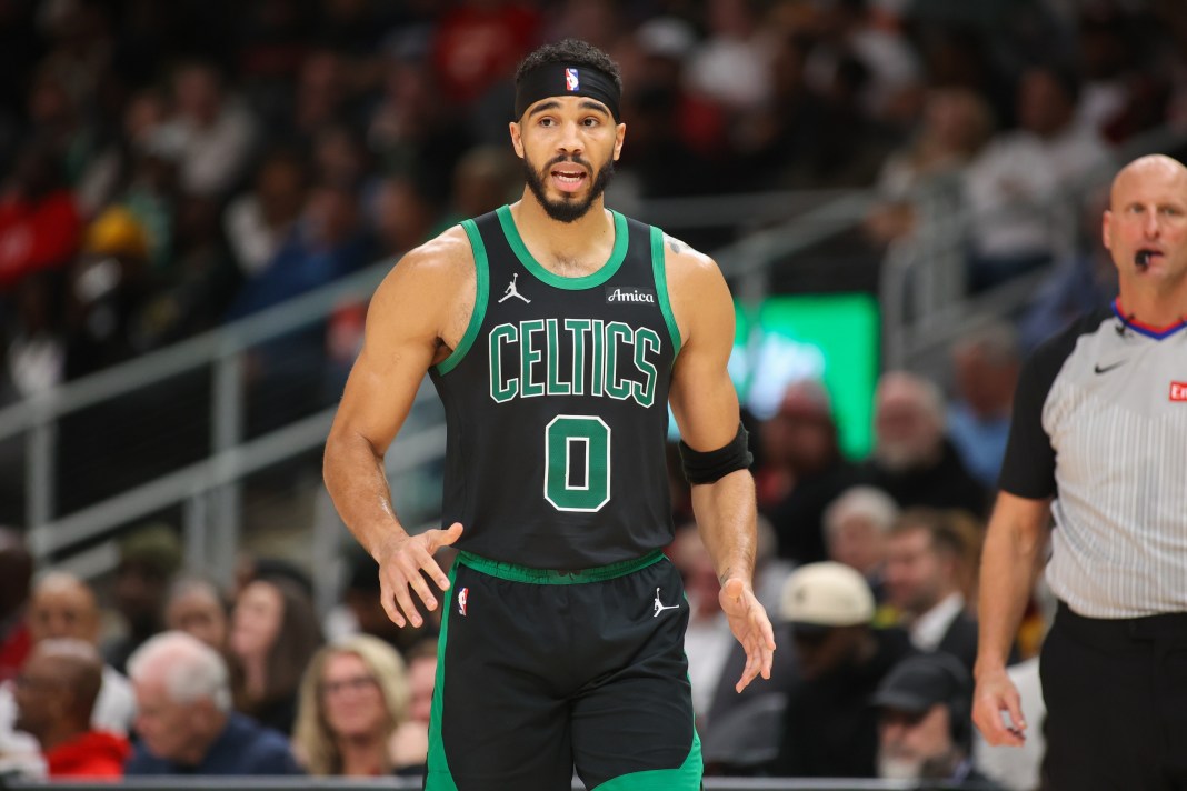 Celtics star Jayson Tatum walks around in a meeting with the Hawks in the 2024-25 NBA season.