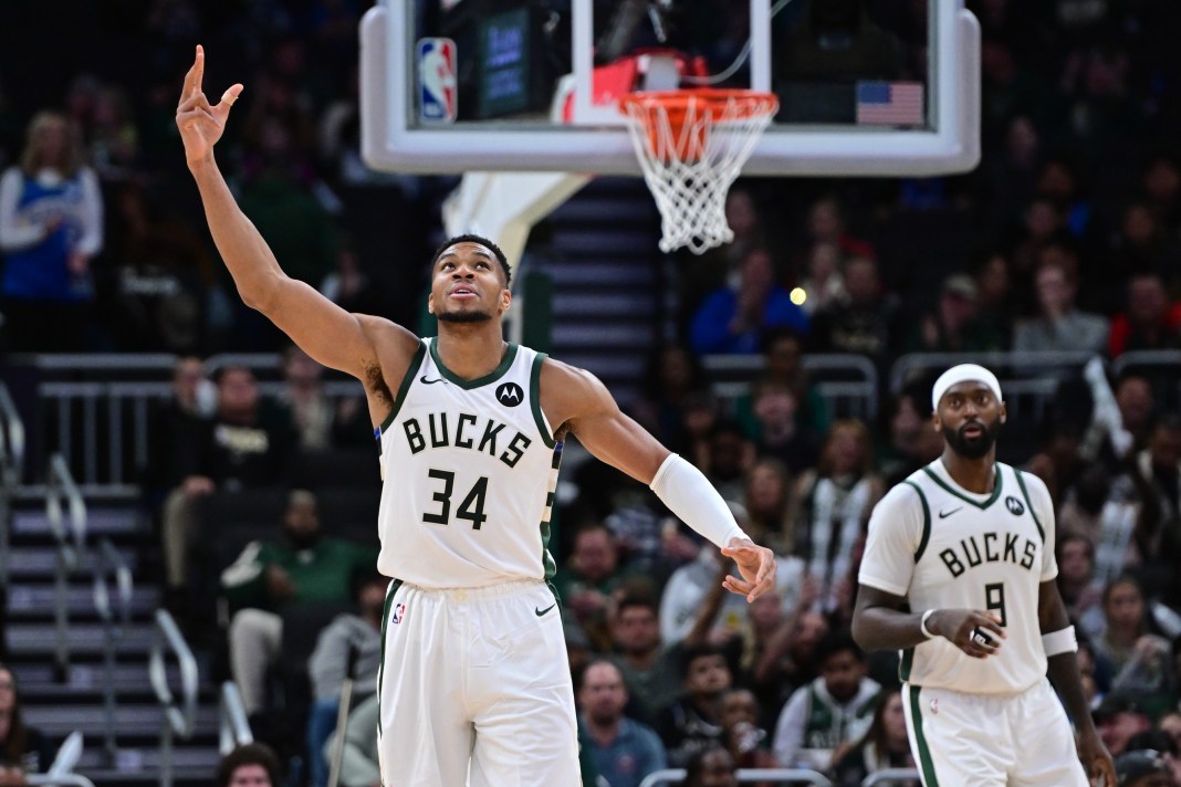 Bucks superstar Giannis Antetokounmpo pumps up the crowd in a game against the Jazz in the 2024-25 NBA season.