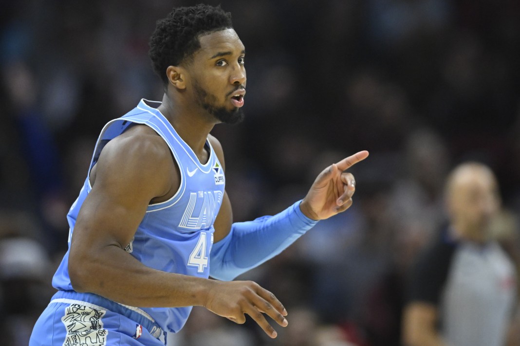 Cleveland Cavaliers guard Donovan Mitchell celebrates his three-point basket in the second quarter against the Denver Nuggets