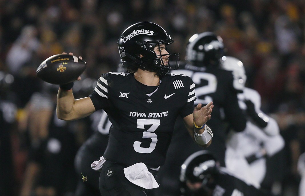 Iowa State Cyclones quarterback Rocco Becht passes the ball against Cincinnati