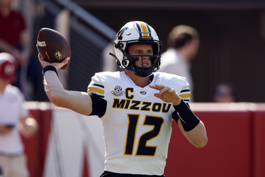 Missouri quarterback Brady Cook throws a pass against Alabama during the 2024 college football season.