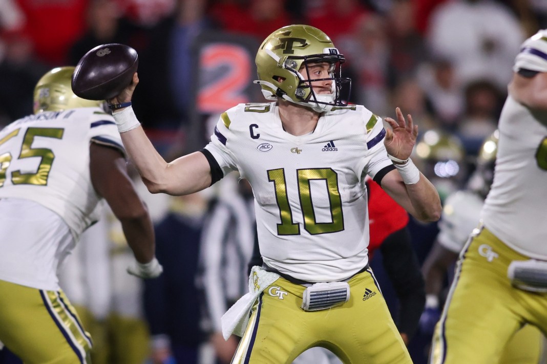 Georgia Tech quarterback Haynes King attempts a pass against Georgia during the 2024 college football season.