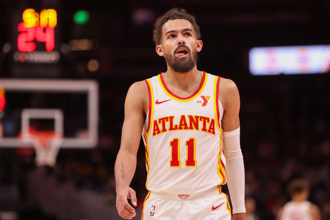 Hawks star Trae Young walks around in a meeting with the Pelicans during the 2024-25 NBA season.