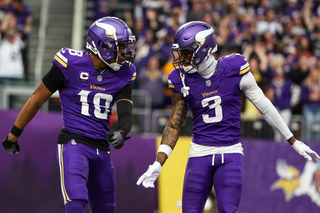 Vikings receivers Justin Jefferson and Jordan Addison celebrate a touchdown during the 2024 NFL season.