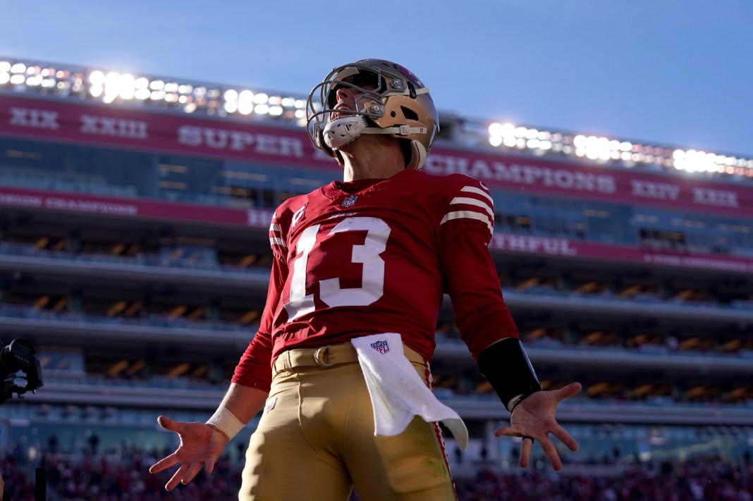 49ers quarterback Brock Purdy reacts to a touchdown against the Bears in Week 14 of the 2024 NFL season.