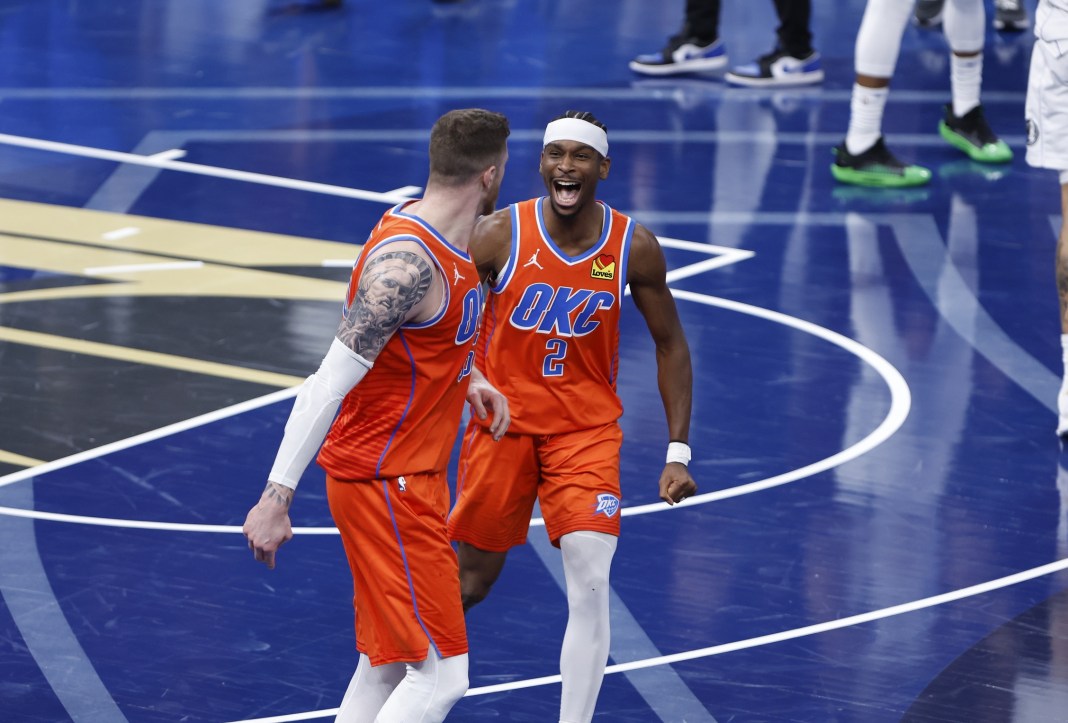 Thunder star Shai Gilgeous-Alexander celebrates an NBA Cup win with teammate Isaiah Hartenstein during the 2024-25 NBA season.