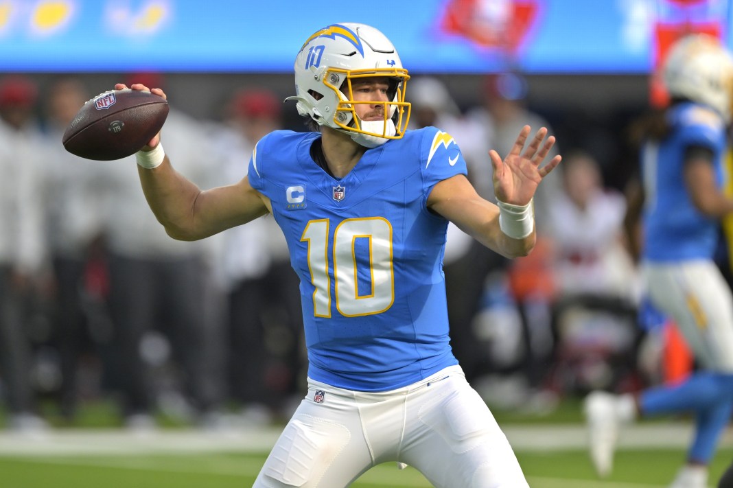 Chargers star Justin Herbert throws a pass against the Buccaneers during the 2024 NFL season.