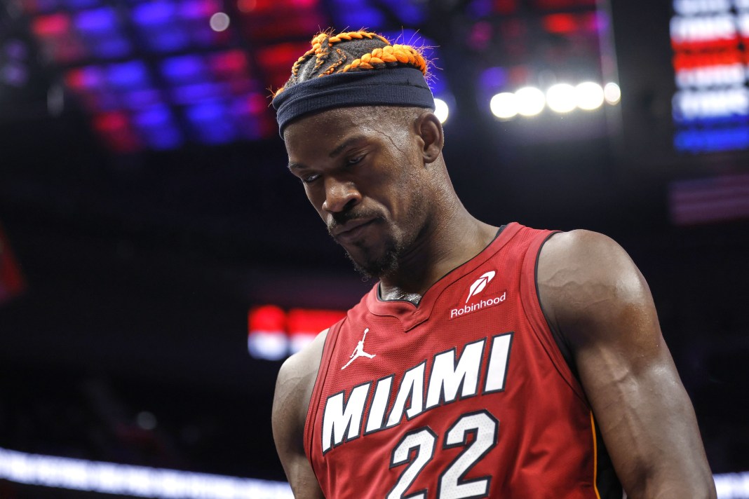 Heat star Jimmy Butler looks around during a game with the Pistons during the 2024-25 NBA season.